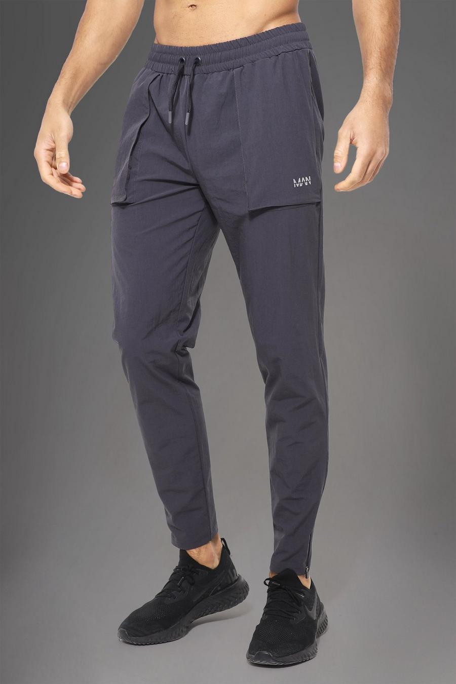 Pantaloni tuta Man Active Gym in nylon con tasche grandi squadrate, Charcoal gris