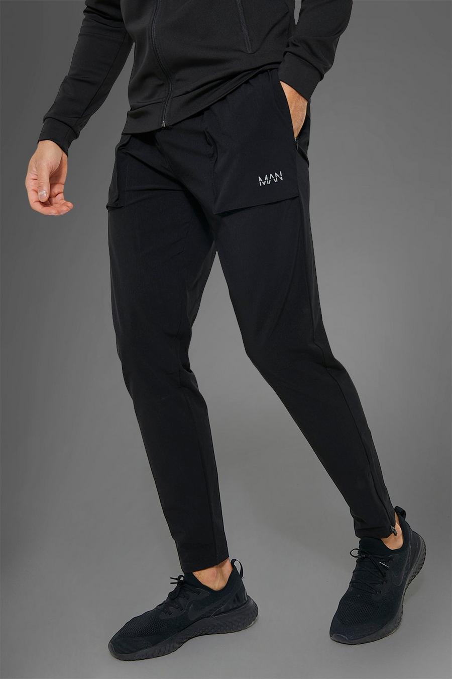 Pantaloni tuta Man Active Gym in nylon con tasche grandi squadrate, Black image number 1
