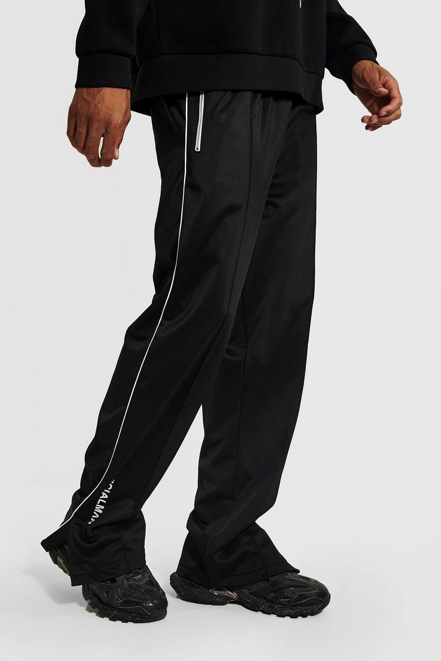 Pantalón Tall MAN Official holgado deportivo de tejido por urdimbre con abertura en el bajo, Black image number 1