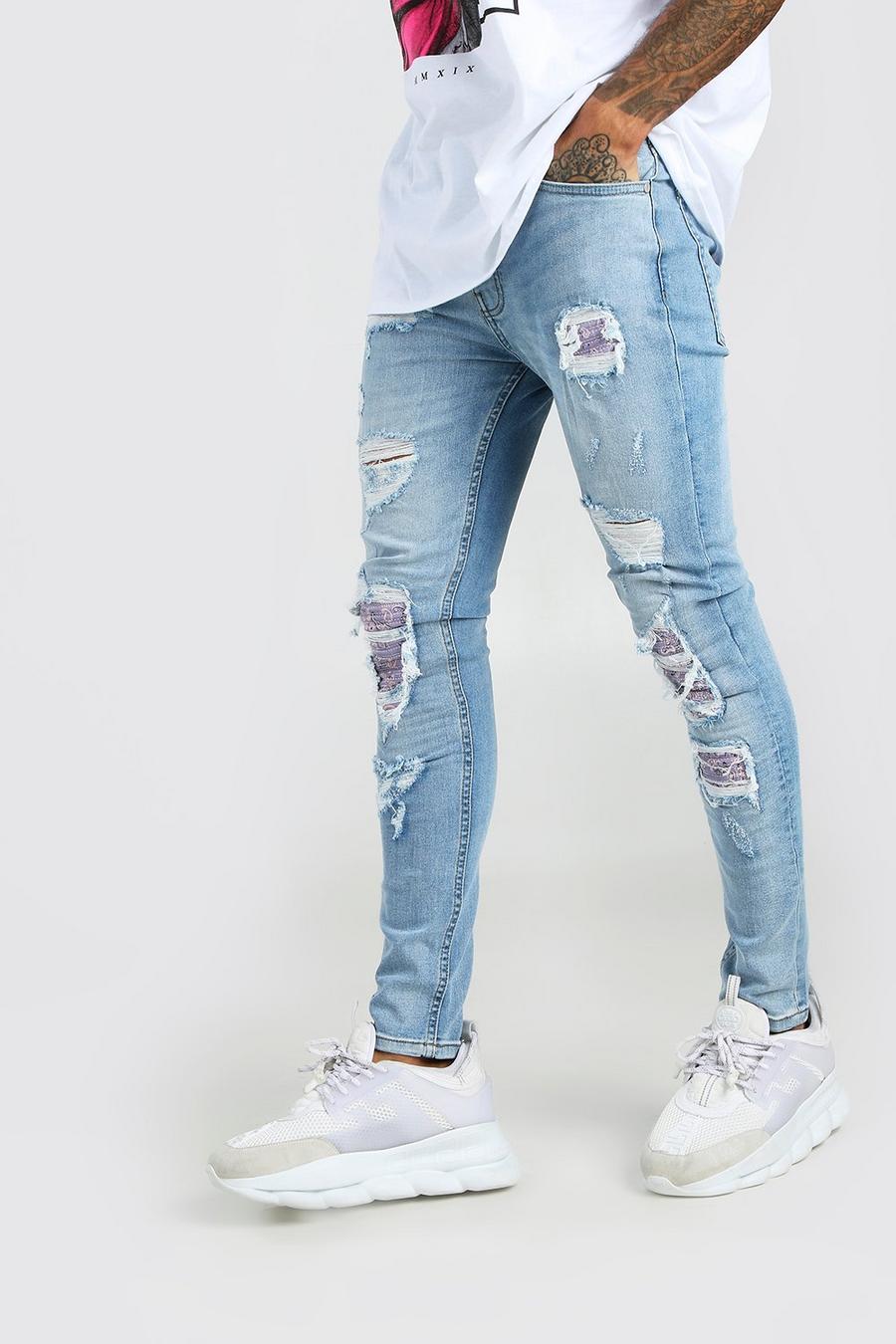 Jeans Super Skinny Fit con strappi & rattoppi in fantasia a bandana, Ice blue image number 1