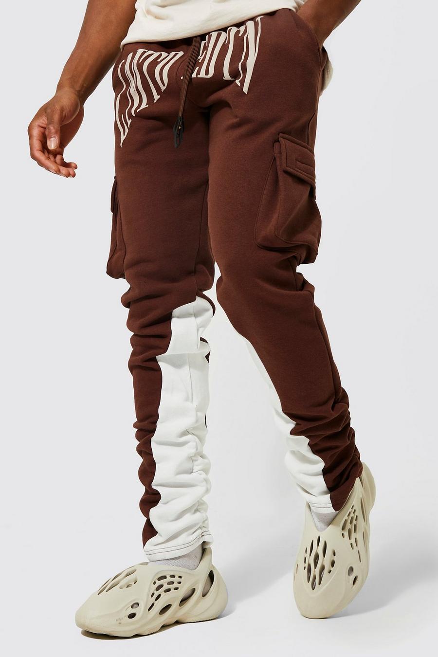 https://media.boohoo.com/i/boohoo/amm13014_chocolate_xl/male-chocolate-limited-edition-stacked-cargo-joggers/?w=900&qlt=default&fmt.jp2.qlt=70&fmt=auto&sm=fit