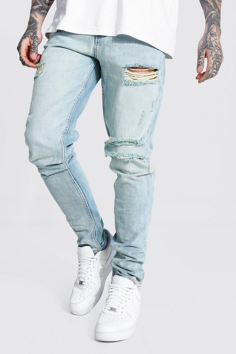 Jeans affusolati rigidi con pieghe sul fondo e strappi, Antique blue