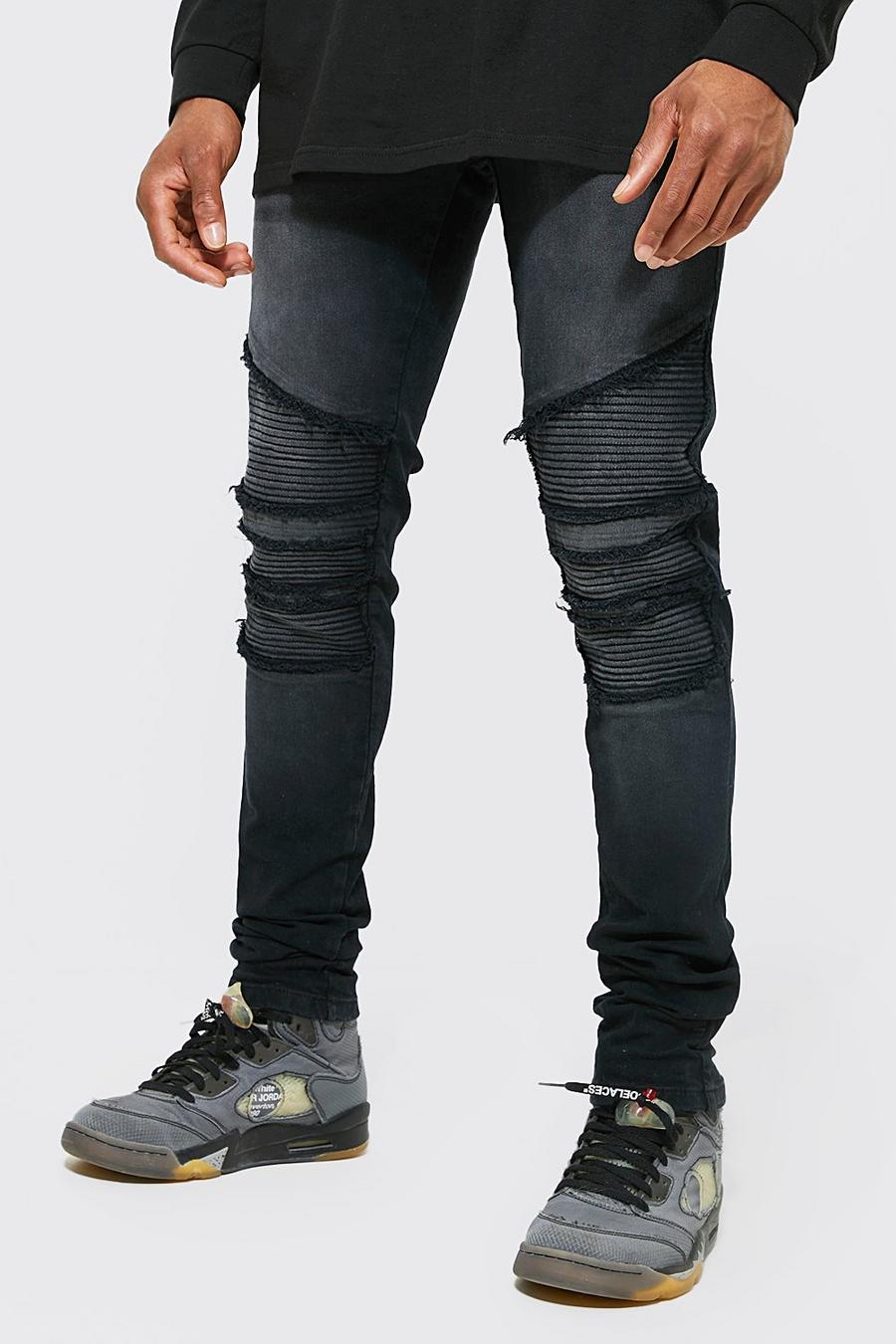 שחור דהוי סקיני ג'ינס אופנוענים עם קרעים ושוליים נערמים ועם רוכסן