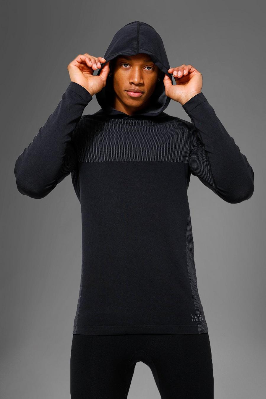 Black svart MAN Active Sömlös hoodie i muscle fit image number 1