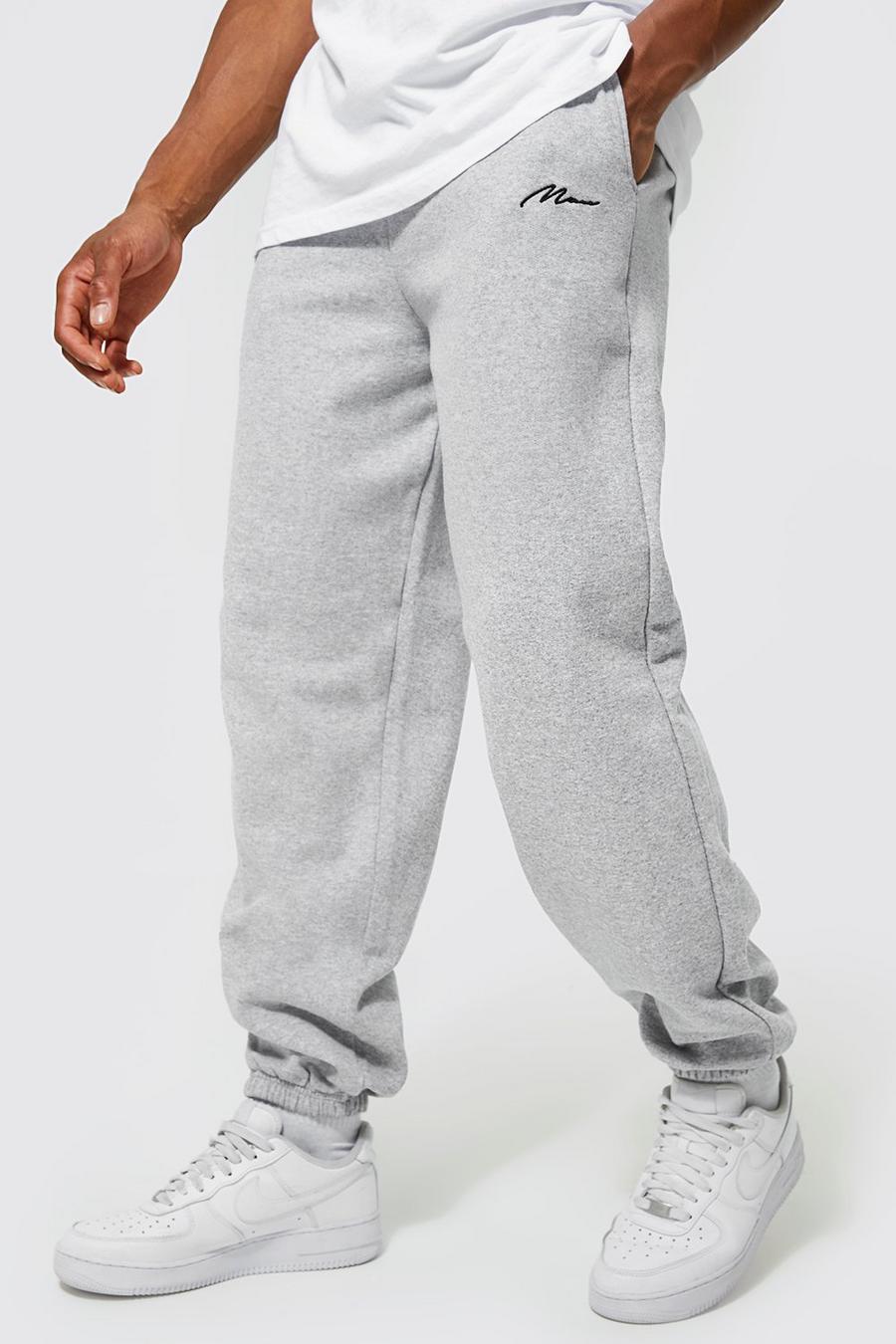 Pantalón deportivo básico Regular con firma MAN, Grey marl image number 1