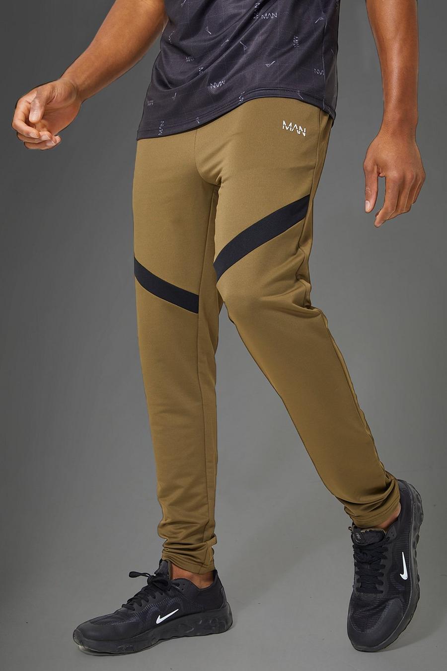 Khaki kaki מכנסי ריצה ספורטיביים עם פסים וכיתוב Man