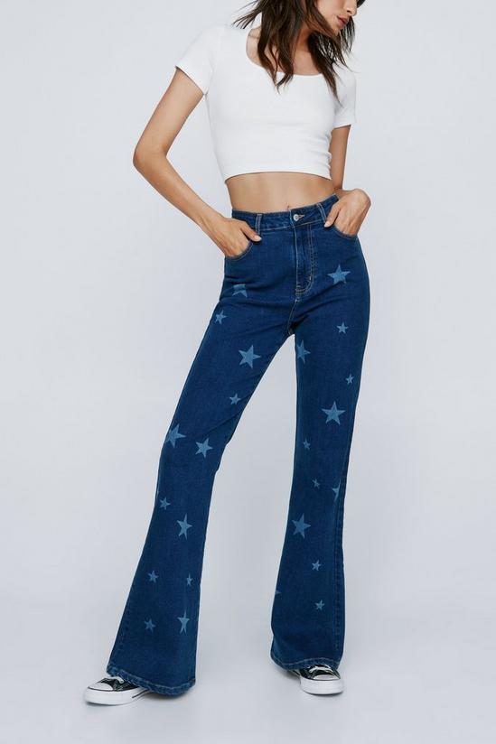 NastyGal Star Print Stretch Denim Flared Trousers 1