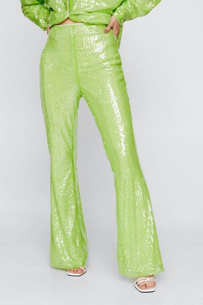 NastyGal green Sequin Kick Flared Pants