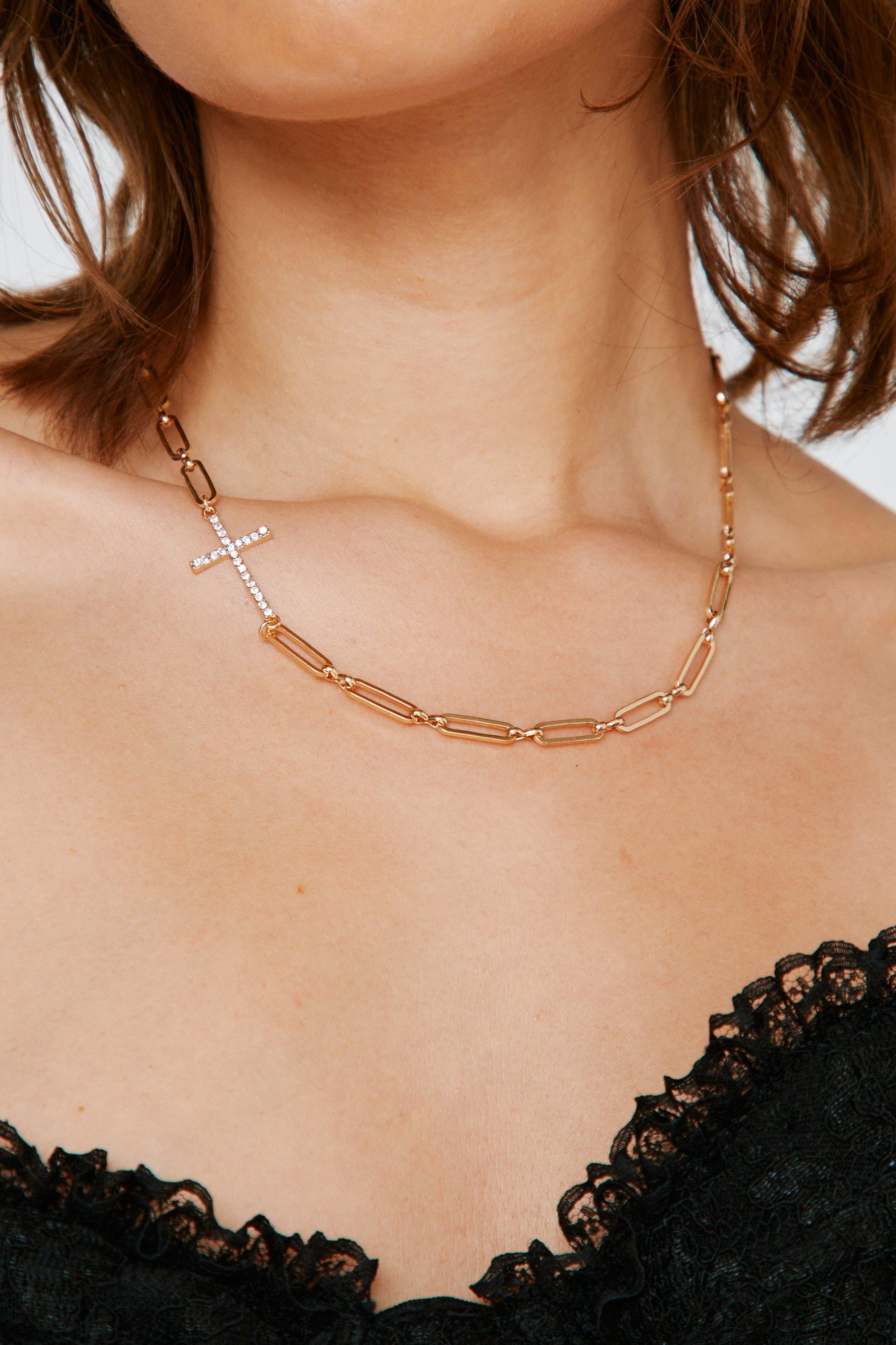 Off center cross on sale necklace