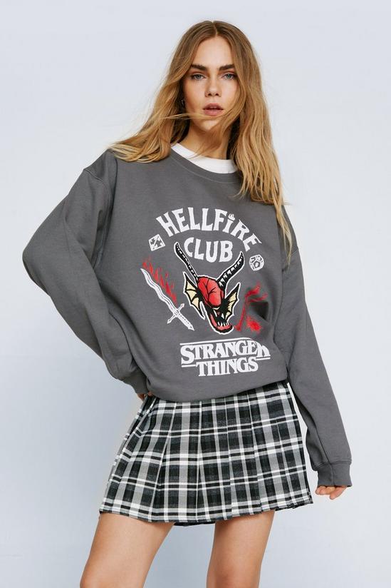 NastyGal Stranger Things Hellfire Club Oversized Washed Sweatshirt 1