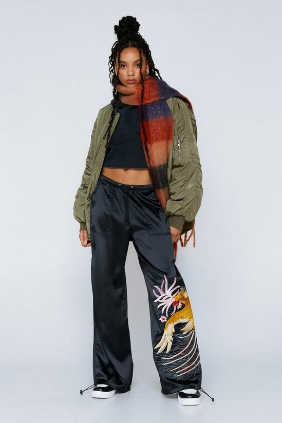 NastyGal Embroidered Parachute Nylon Mid Rise Cargo Pants 1