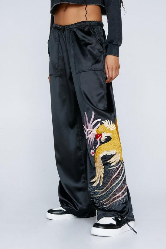 NastyGal Embroidered Parachute Nylon Mid Rise Cargo Pants 2