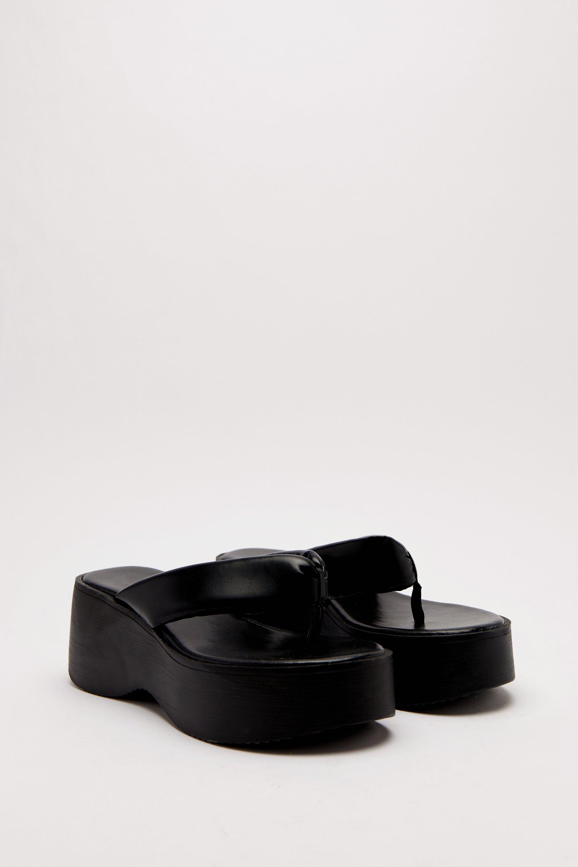 https://media.boohoo.com/i/boohoo/bgg15586_black_xl_3/female-black-faux-leather-platform-flip-flop-sandals
