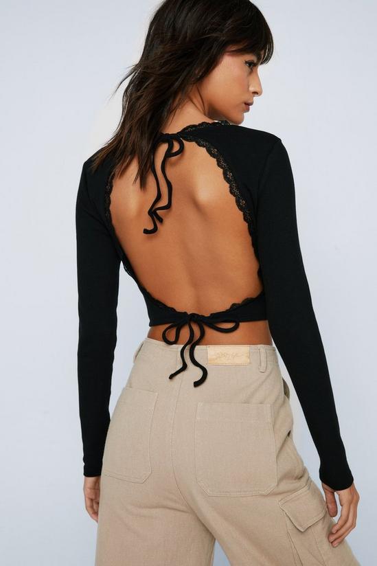 NastyGal Lace Trim Cut Out Back Top 1