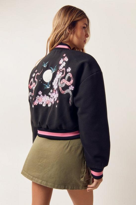 NastyGal Embroidered Knit Varsity Jacket 1