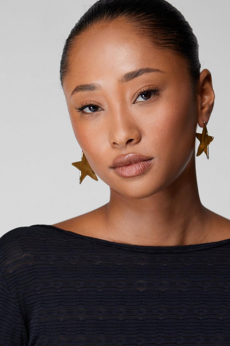 Gold metallic Textured Star Earrings