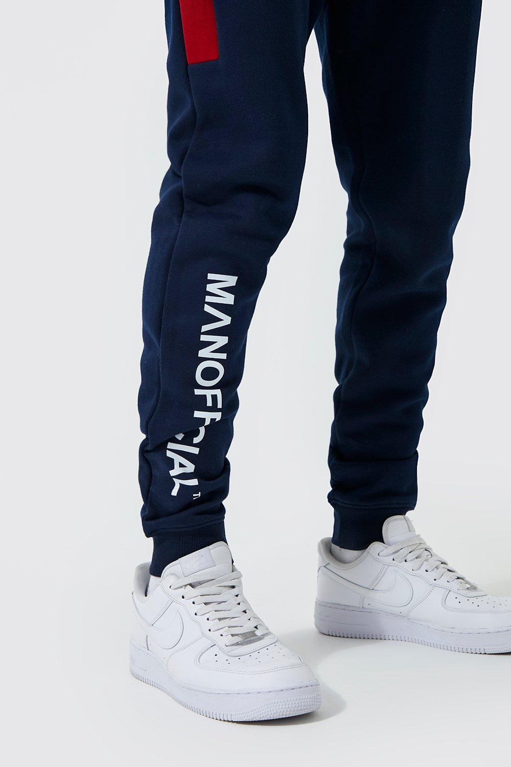 Pantalón deportivo Tall MAN Official pitillo | boohoo