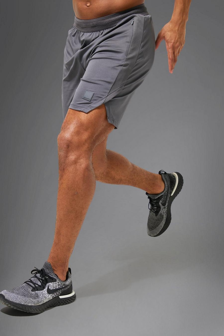 Pantaloncini Man Active per alta performance con spacco sul fondo, Charcoal image number 1