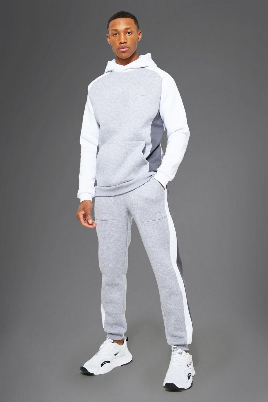 Grey marl grigio חליפת טרנינג קפוצ'ון ספורטיבי קולור בלוק עם כיתוב Man