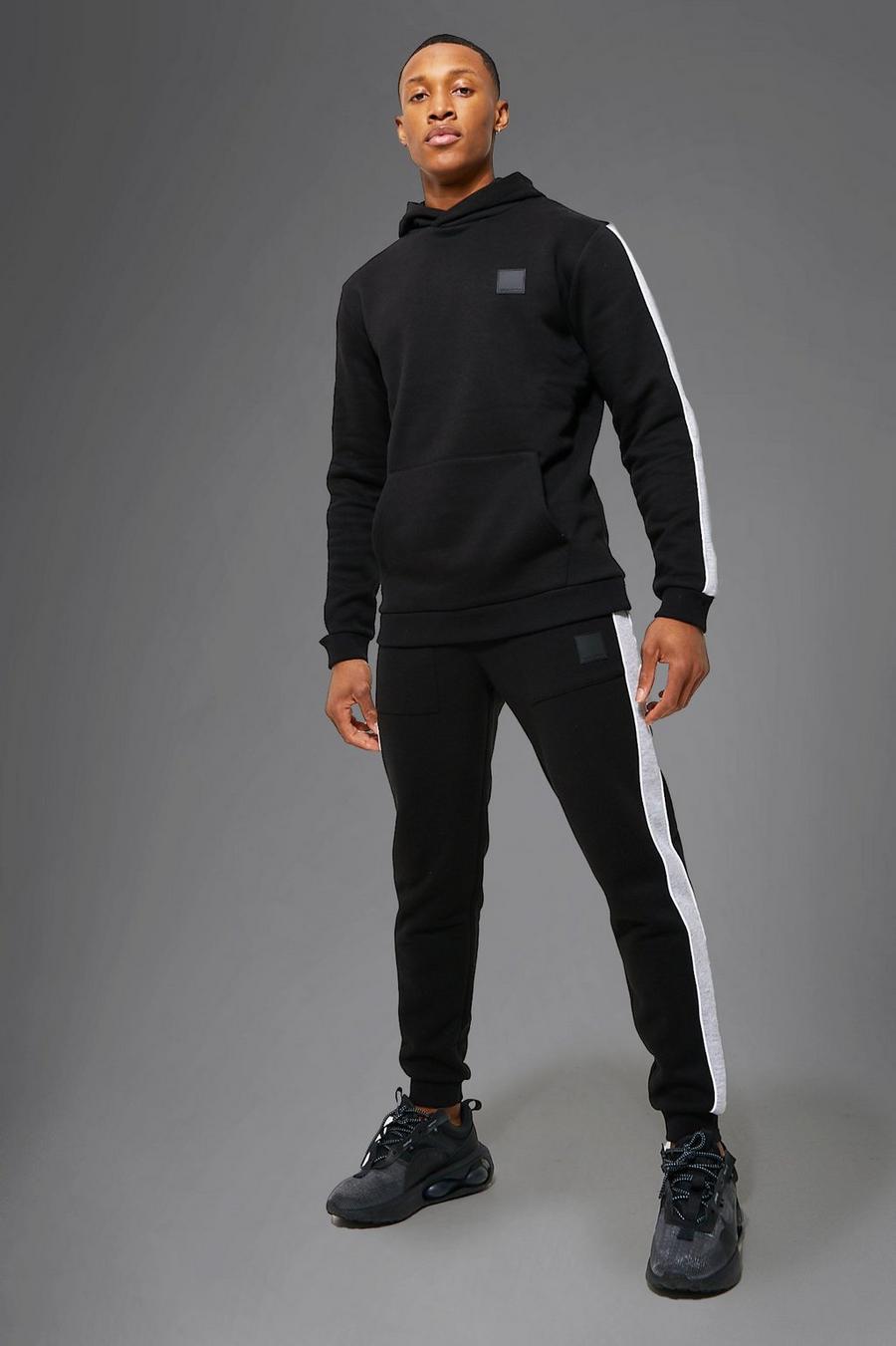 Black  MAN Active Träningsoverall med hoodie och ränder image number 1