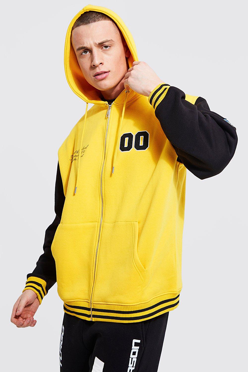 Black, yellow and beige varsity jacket with hoodie front and back