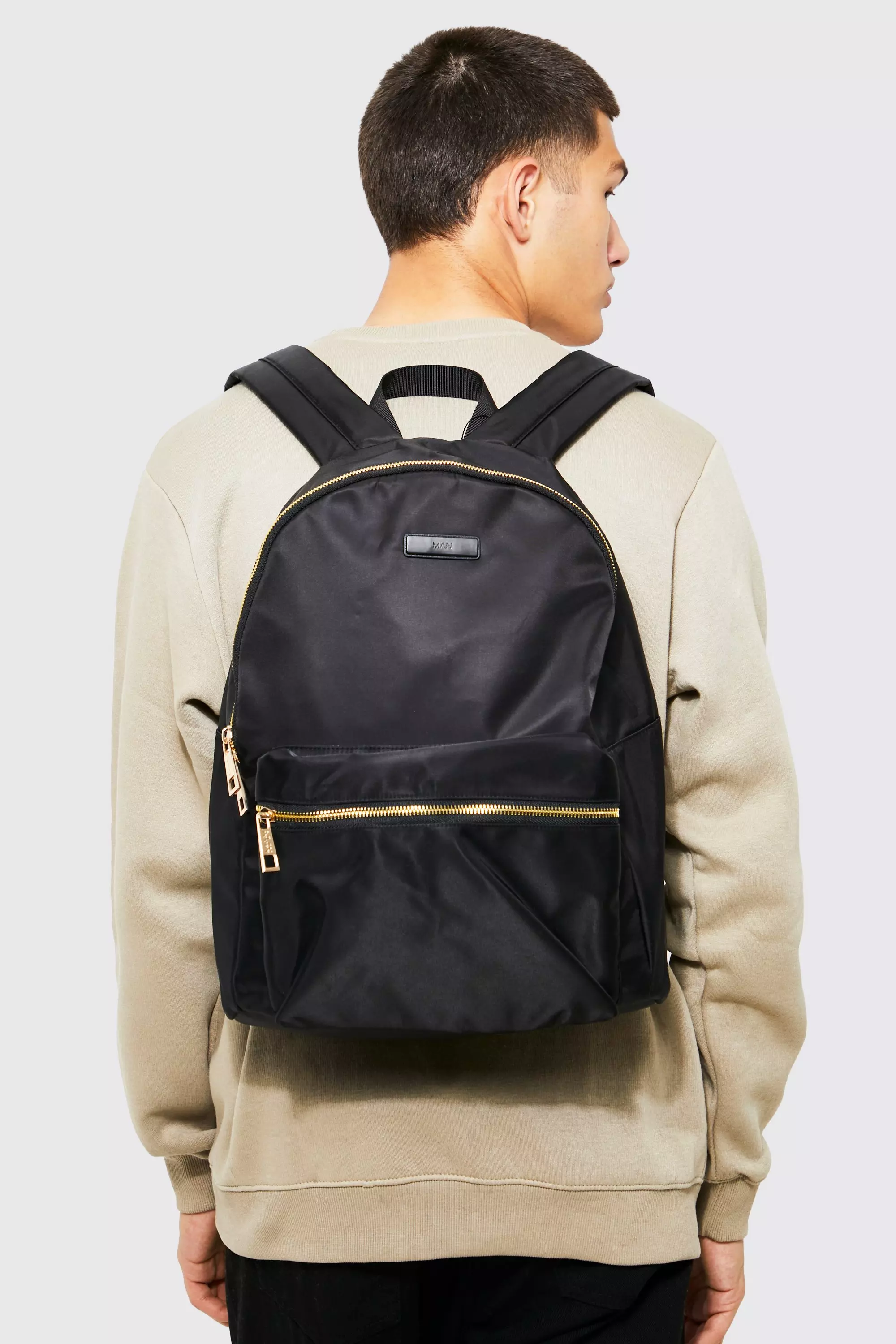 Black backpack gold clearance zip