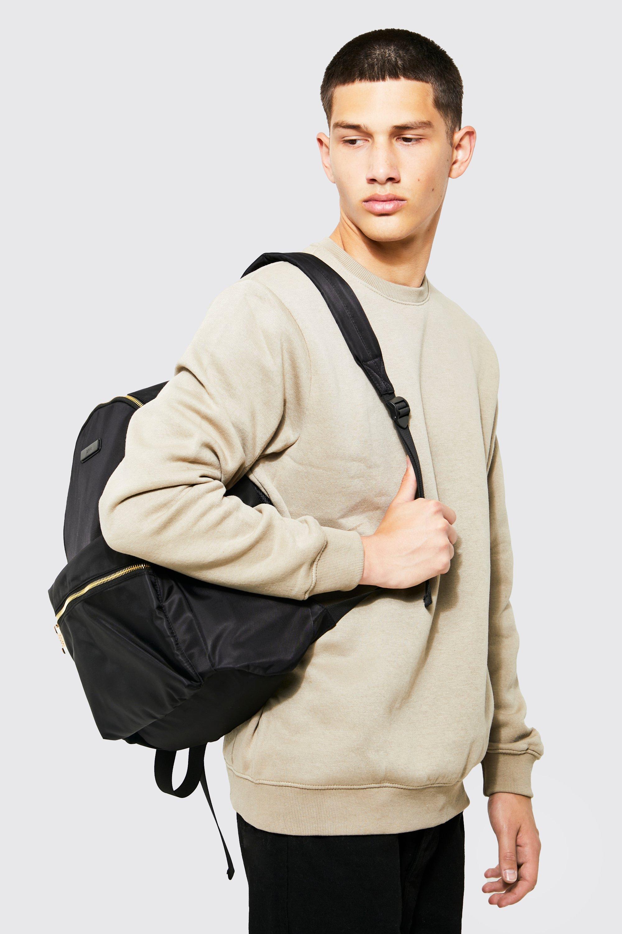 Black and hotsell gold rucksack