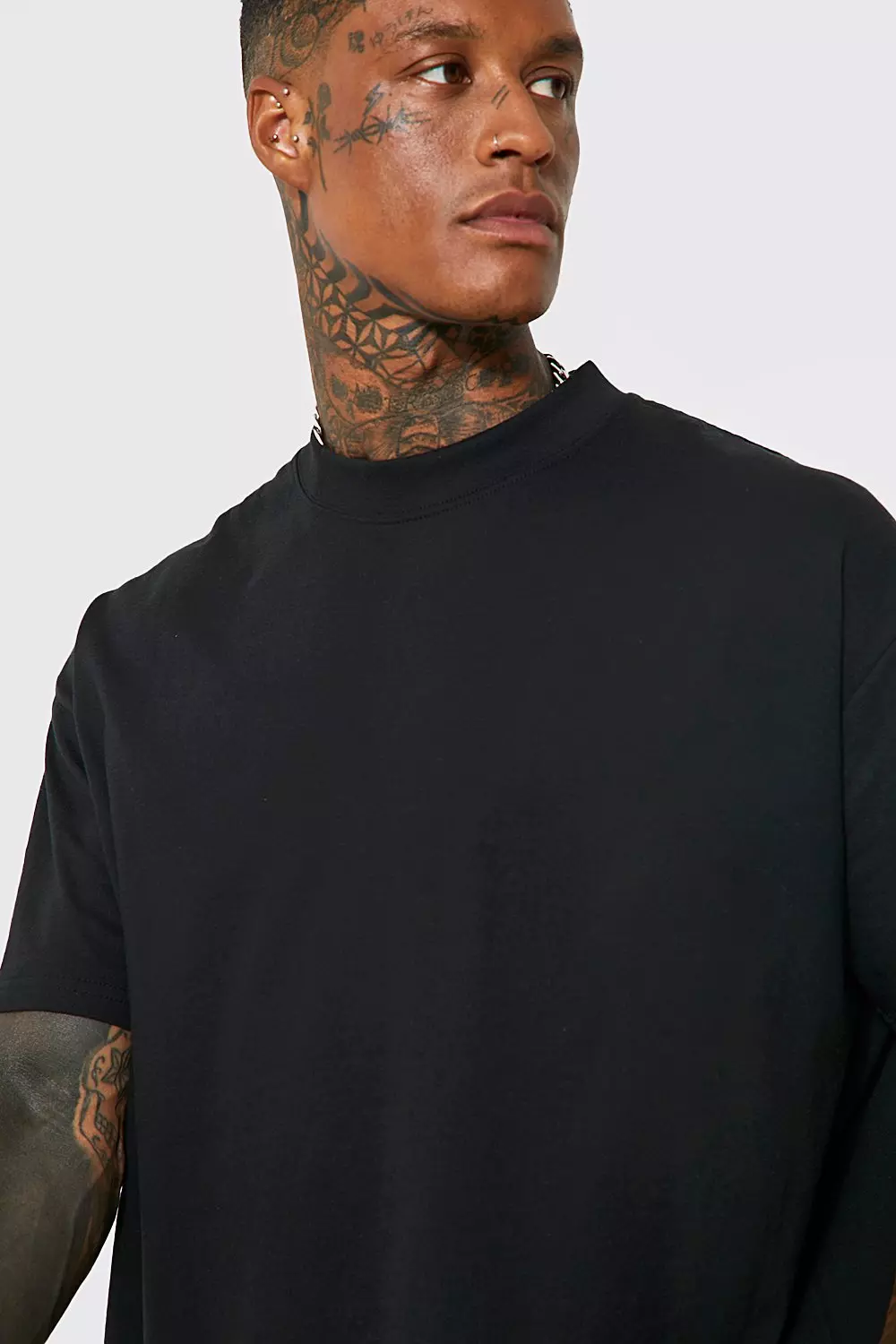 Extended black outlet tee