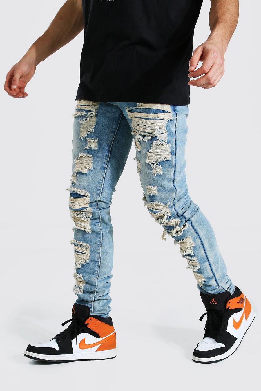 Ice blue Tapered Stacked Leg Shredded Jeans
