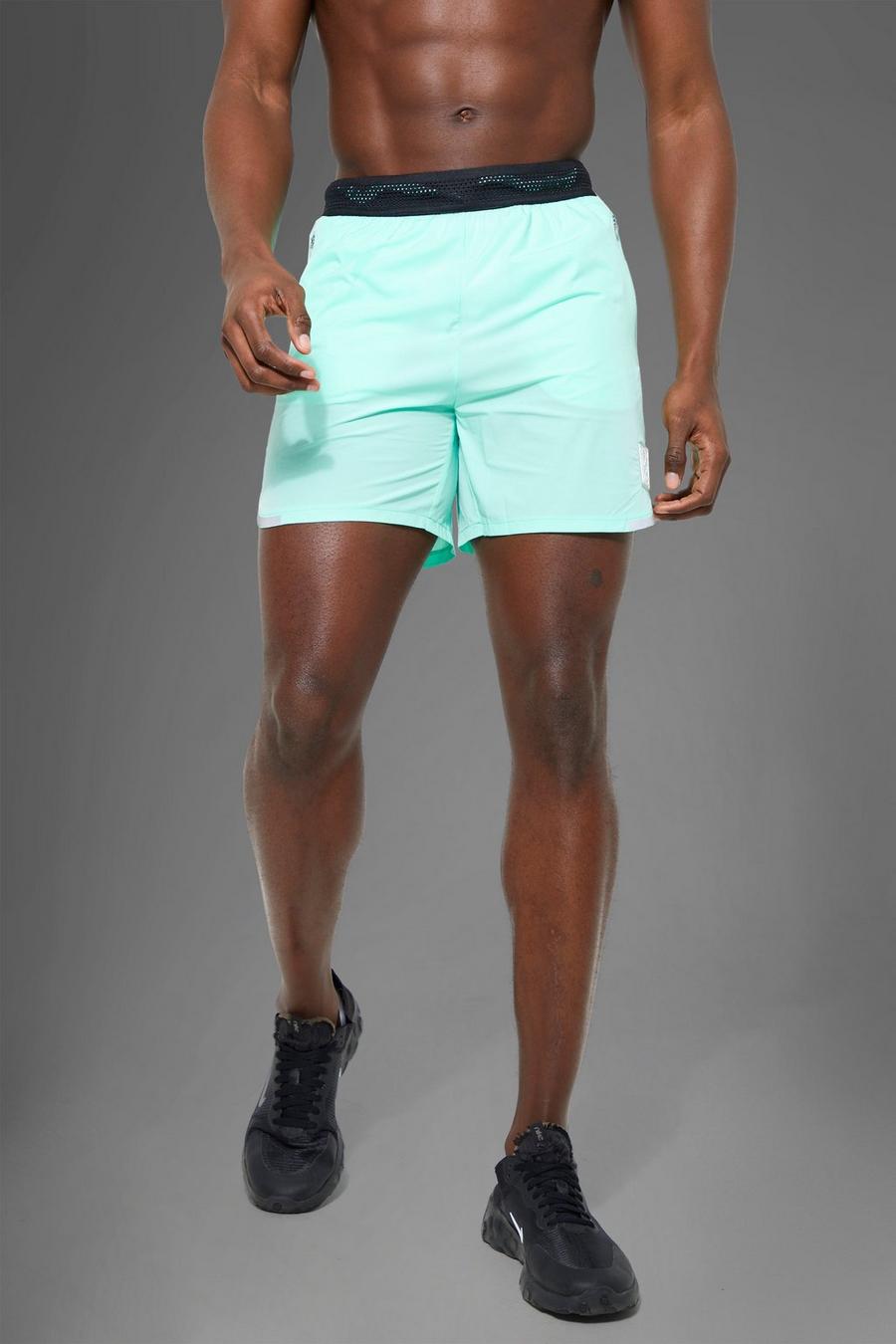 Man Active Shorts mit reflektierendem Detail, Mint green