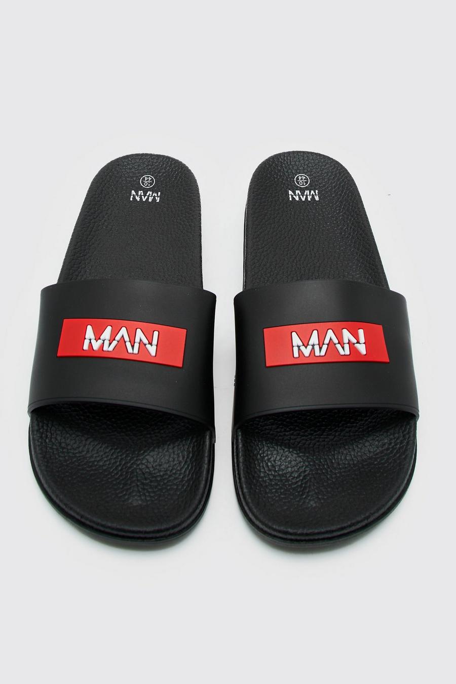 Black Man Slippers Met Logo image number 1