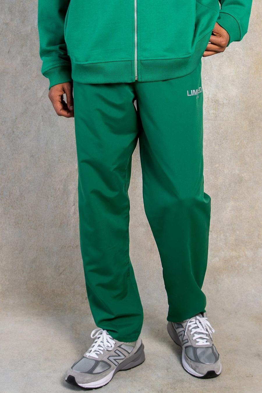 Green verde מכנסיים בגזרה ישרה מבד עמיד בצבע אפרסק עם כיתוב Limited image number 1