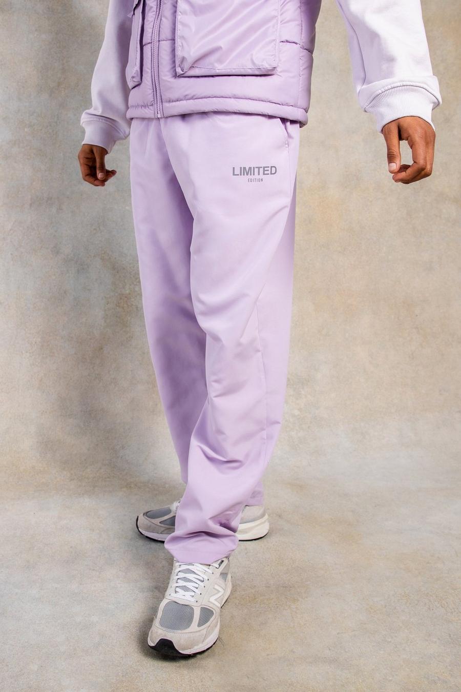 Lilac purple מכנסיים בגזרה ישרה מבד עמיד בצבע אפרסק עם כיתוב Limited