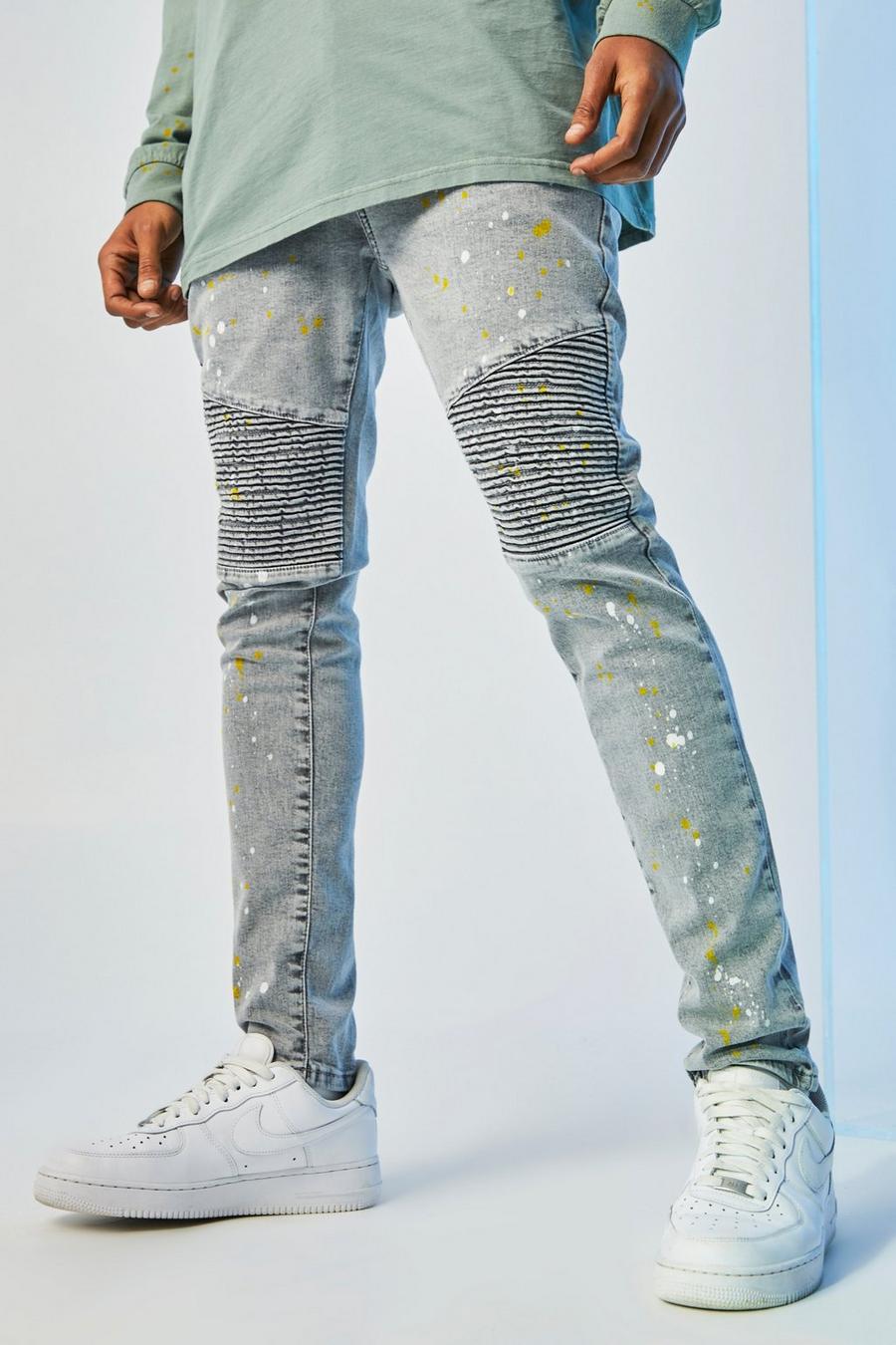 Ice grey Skinny jeans med bikerdetaljer och färgstänk image number 1
