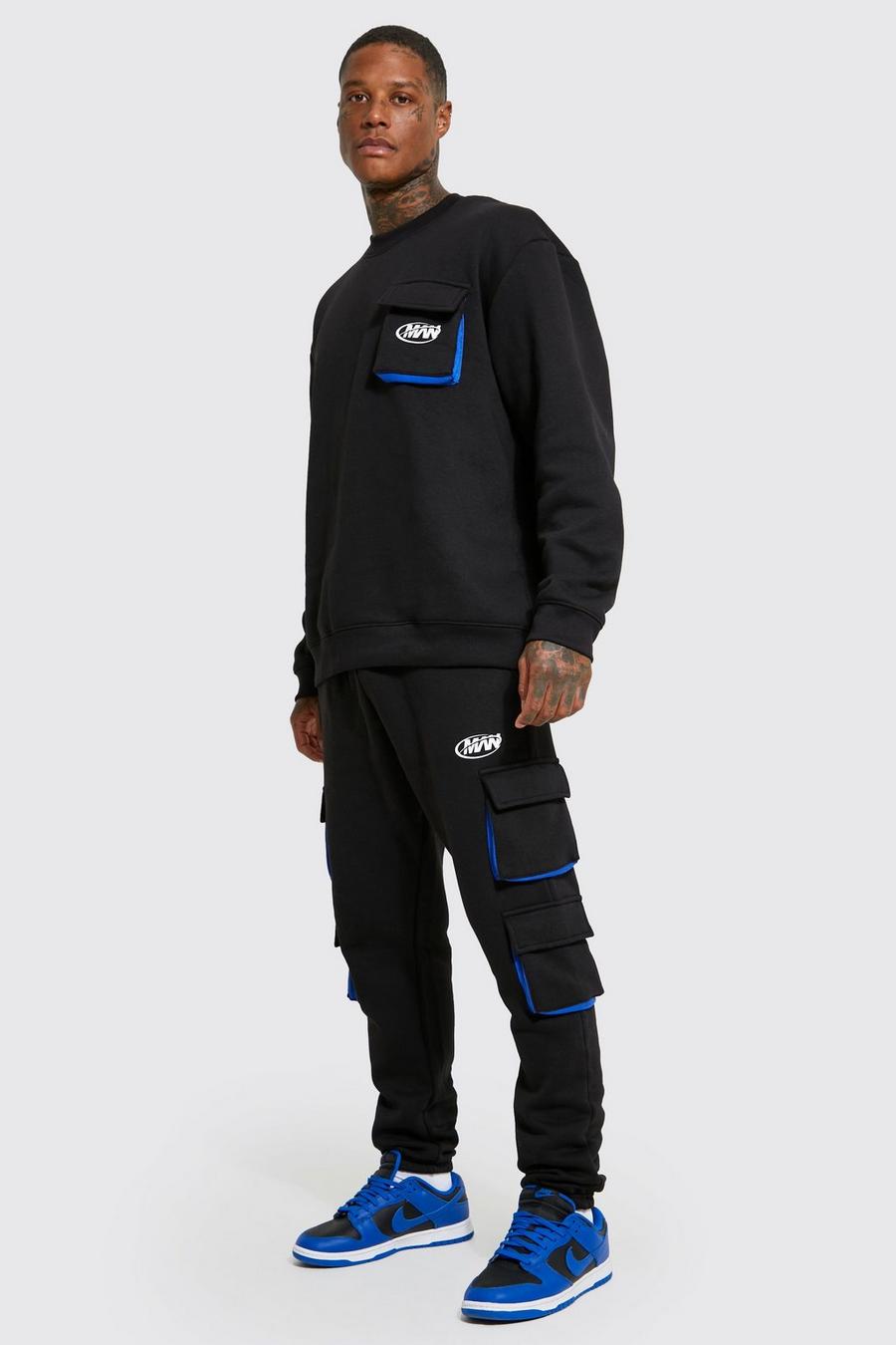 Black svart MAN Oversize träningsoverall med sweatshirt och cargofickor image number 1