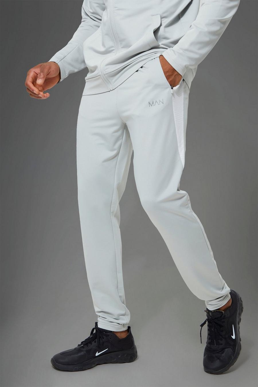 אפור grey מכנסי ריצה ספורטיביים לחדר הכושר עם פאנל ג'קארד, מסדרת Man  image number 1