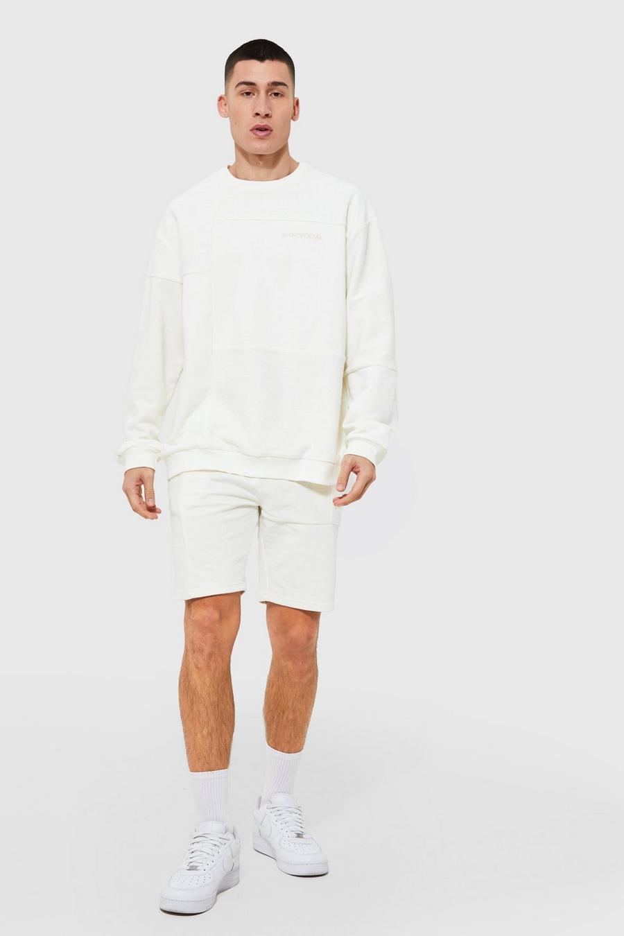Ecru white MAN Oversize träningsoverall med shorts och patchwork image number 1