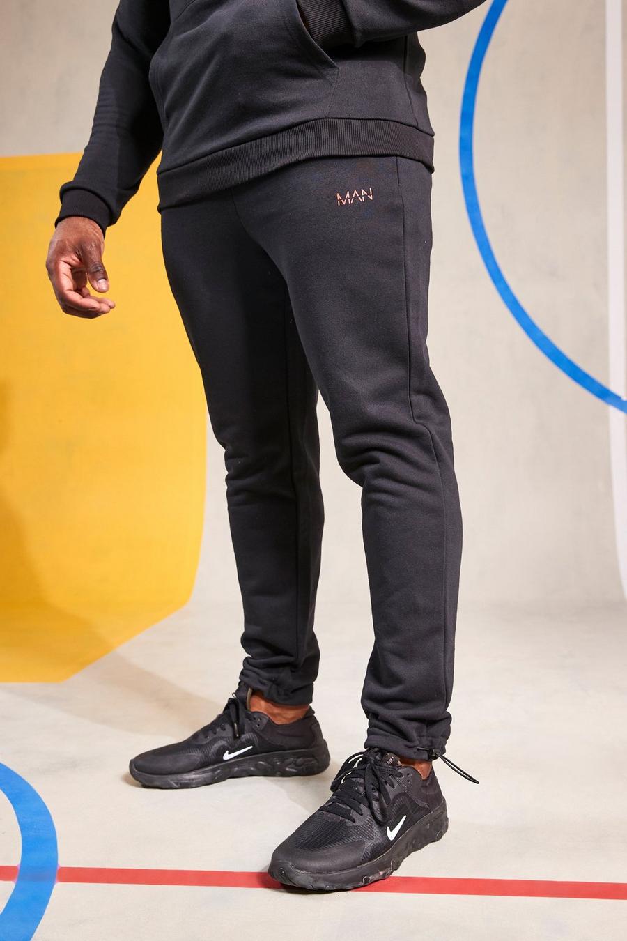 Pantalón deportivo MAN Active atlético con alamar en el bajo, Black negro image number 1