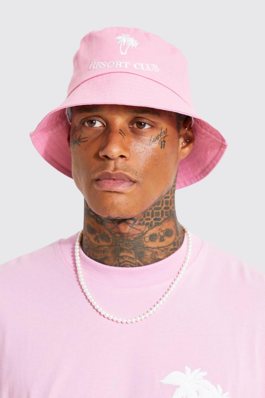 https://media.boohoo.com/i/boohoo/bmm08549_pink_xl/male-pink-embroidered-bucket-hat/?w=900&qlt=default&fmt.jp2.qlt=70&fmt=auto&sm=fit