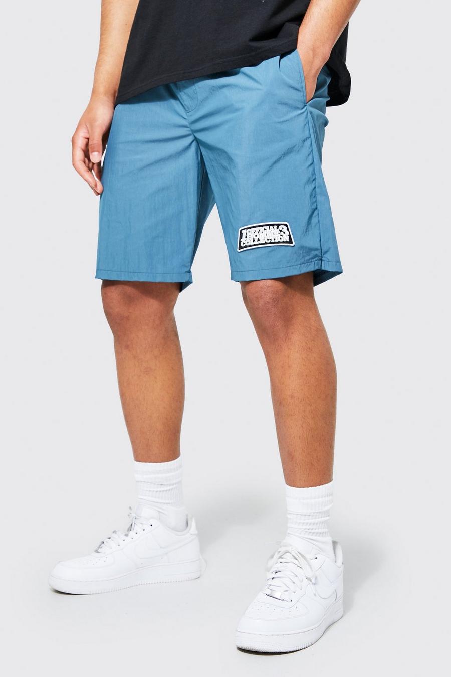 Pantaloncini Tall in Shell stile Varsity effetto velluto goffrato, Light blue image number 1