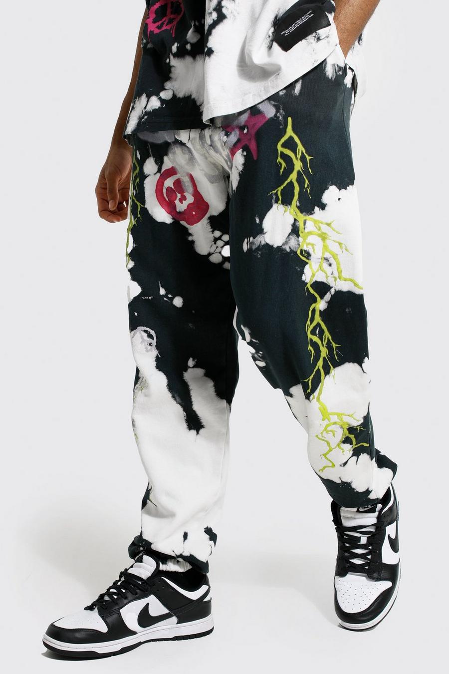 Oversized Graffiti Graphic Bleached Joggers | boohoo