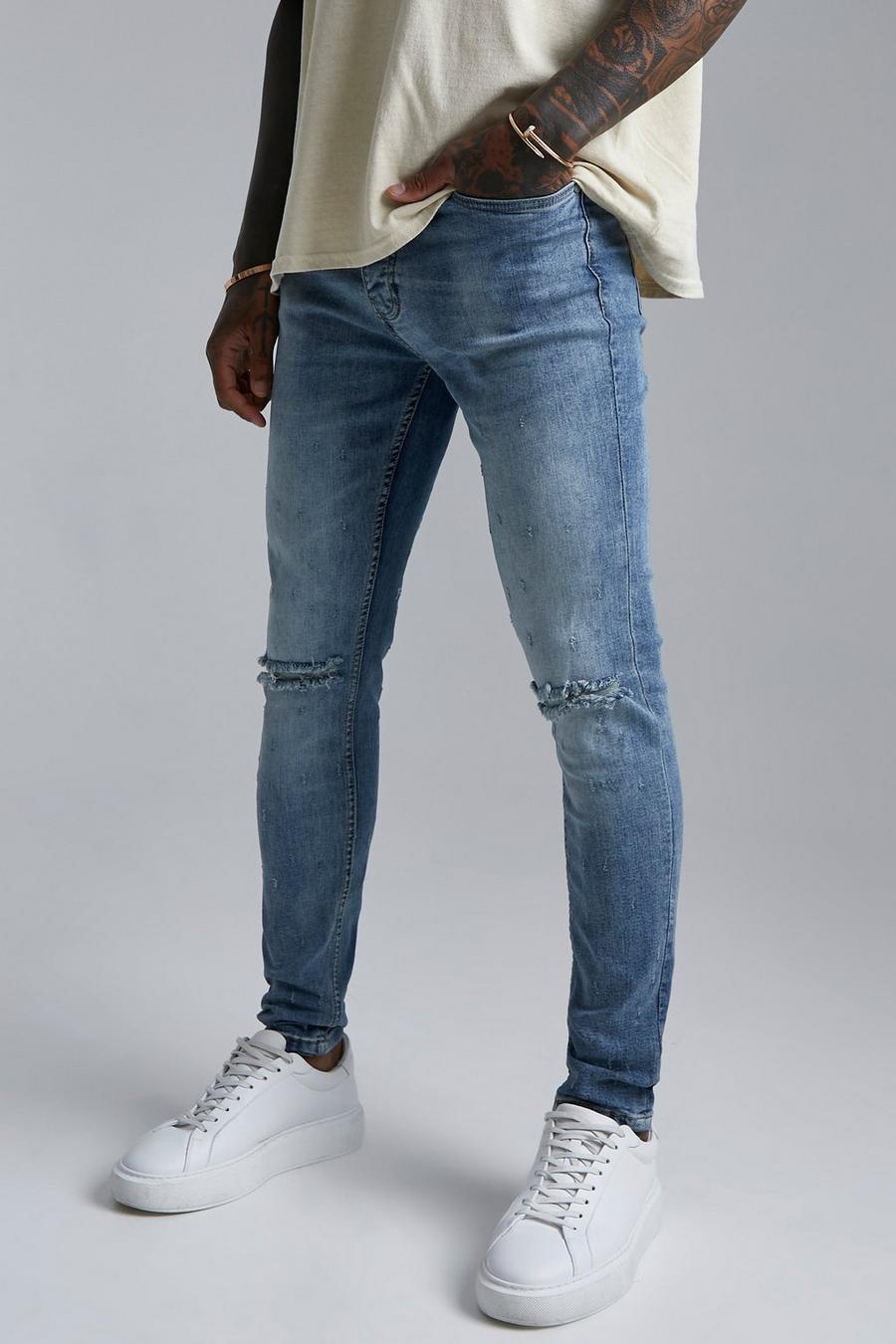Light blue Skinny Stretch Busted Knee Distressed Jeans image number 1