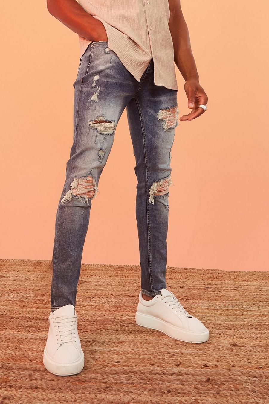 Jeans Skinny Fit Stretch con pieghe sul fondo e strappi & rattoppi colorati, Ice blue image number 1
