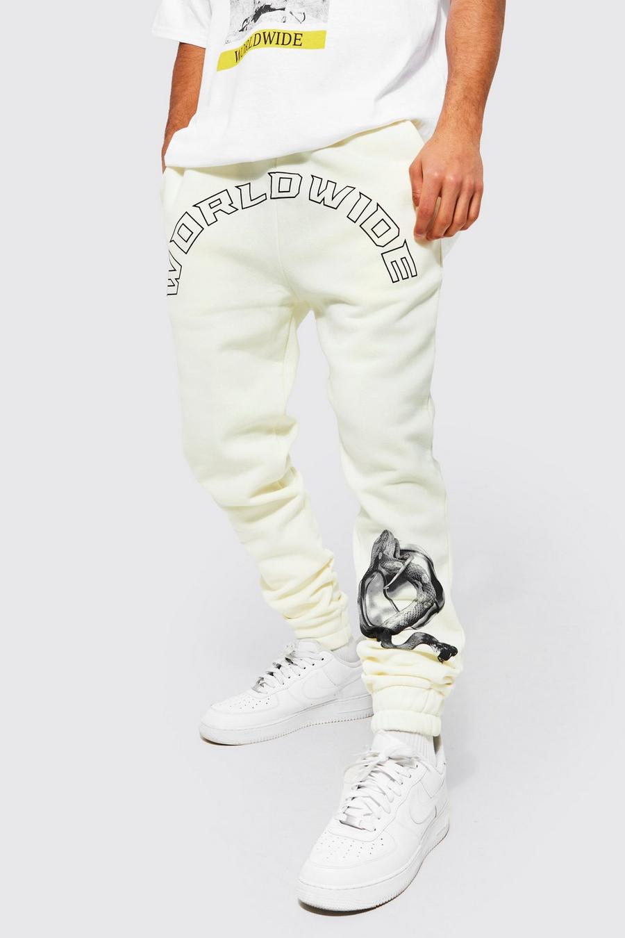 שמנת blanco מכנסי טרנינג בגזרה רגילה עם כיתוב Worldwide