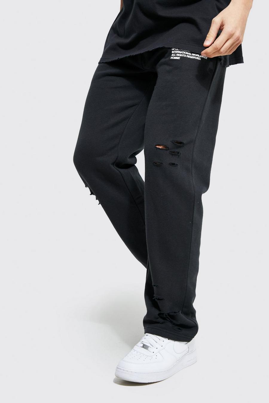 Dark grey מכנסי ריצה אוברסייז בגזרה רחבה עם קרעים, מסדרת MAN   image number 1