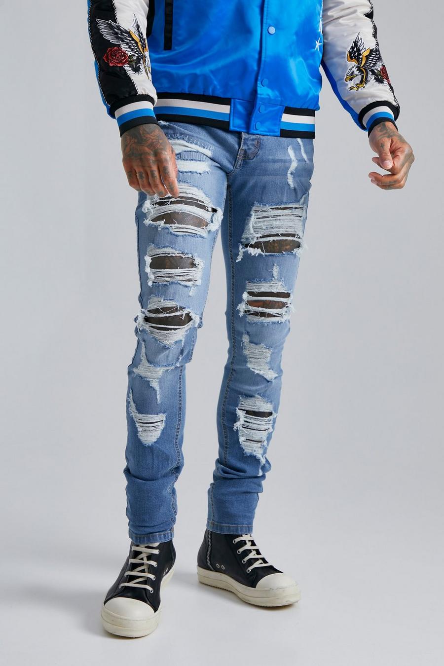Light blue Skinny Stretch Stacked Leg Multi Ripped Jeans image number 1