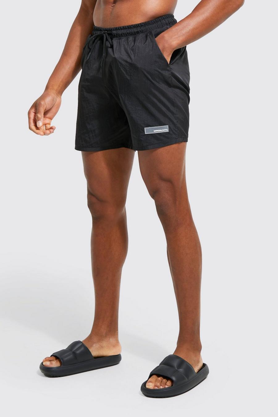 Black Mid Length Nylon Man Rubber Tab Swim Shorts image number 1