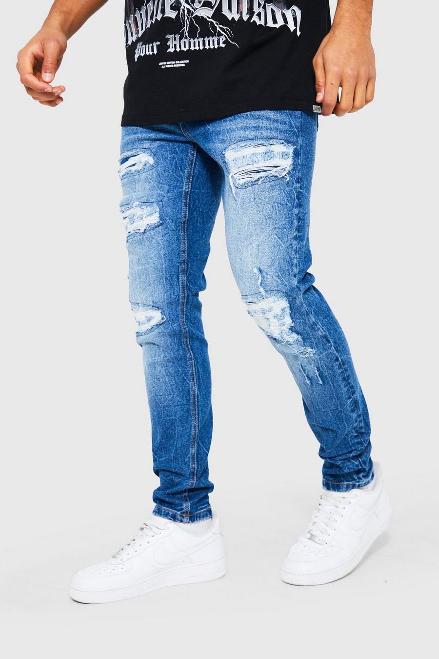 Mid blue blau Skinny Stretch Busted Knee Rip & Repair Jeans image number 1