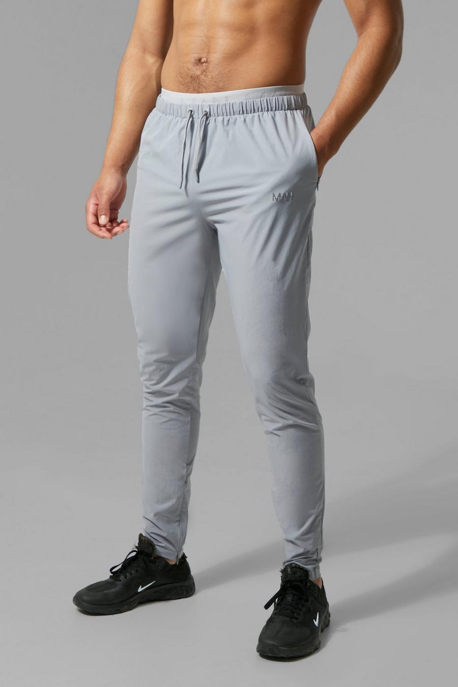 אפור grigio מכנסי ריצה עם כיתוב Man וגומי מעוטר במותניים לגברים גבוהים