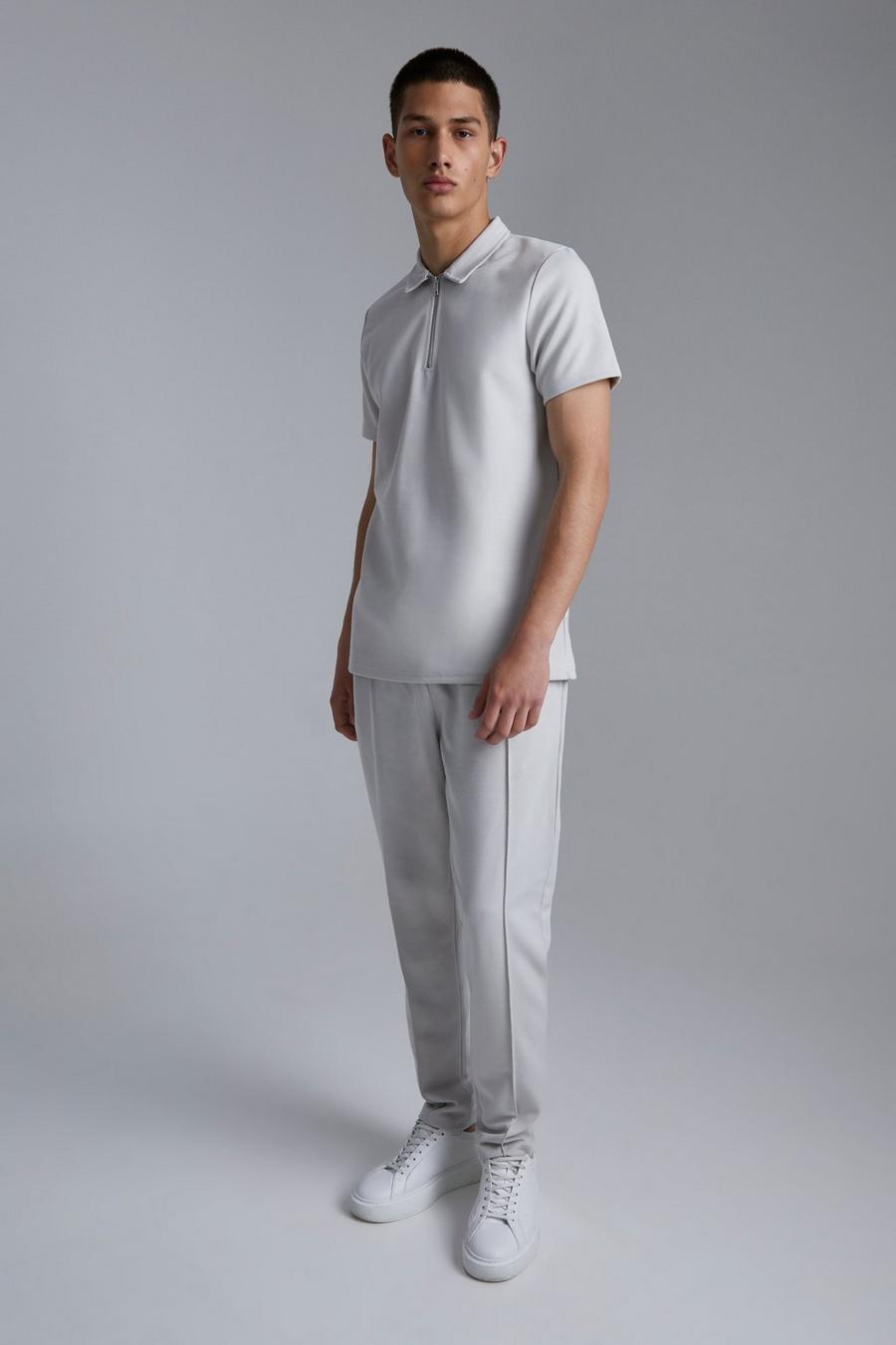 Muscle-Fit Poloshirt mit 1/4 Reißverschluss und Jogginghose, Light grey